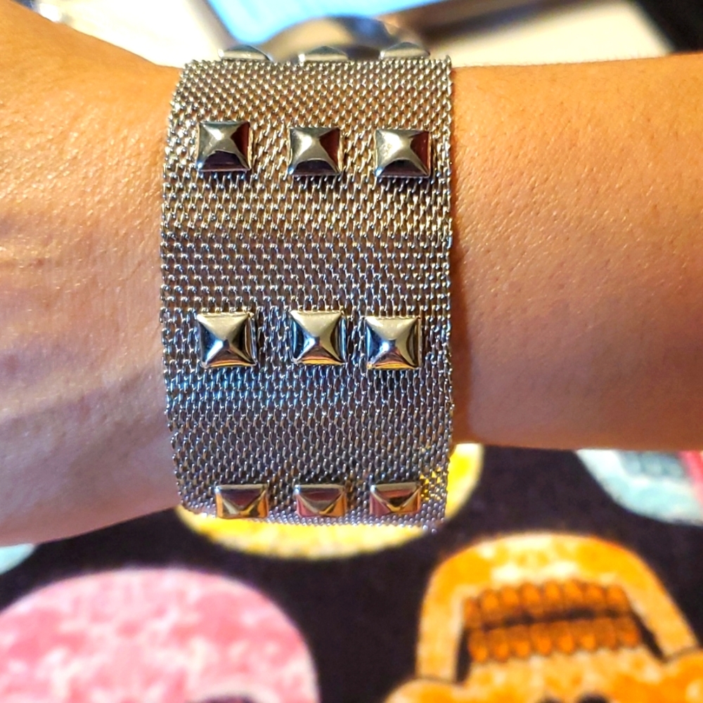 Studded mesh magnetic buckle Chrome bracelet. A must have for a night of music.